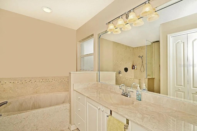 full bathroom featuring walk in shower, a bath, and vanity