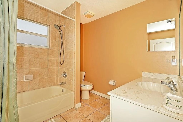 bathroom with vanity, baseboards, tile patterned floors, toilet, and shower / tub combo with curtain