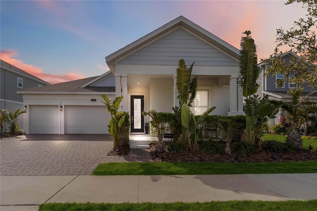 view of front of home with a garage