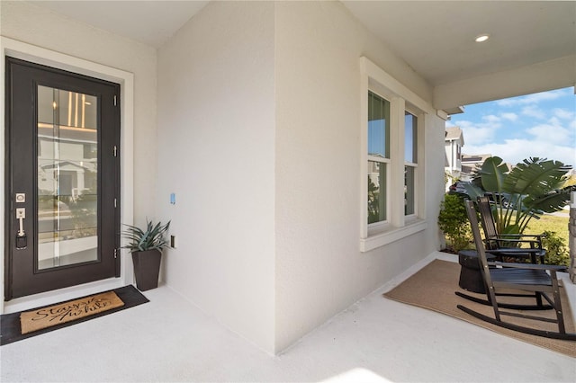 entrance to property with a porch