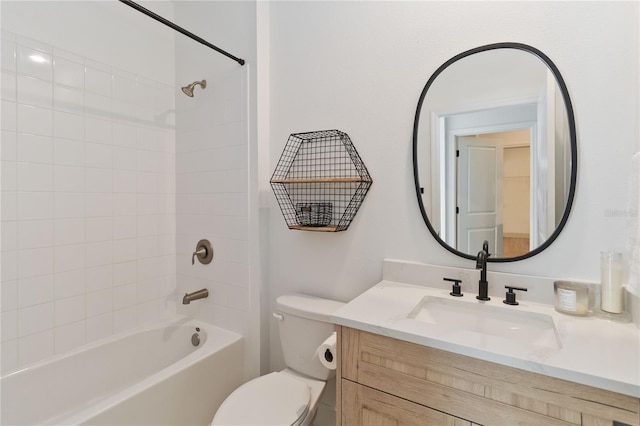 full bathroom featuring tub / shower combination, toilet, and vanity