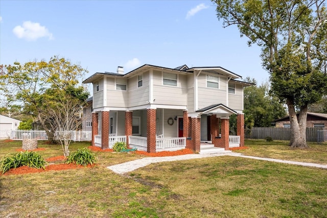 view of front of house featuring a porch and a front yard