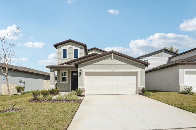 view of front of property featuring an attached garage, concrete driveway, and a front yard