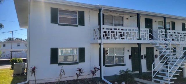 view of front of home featuring central AC unit