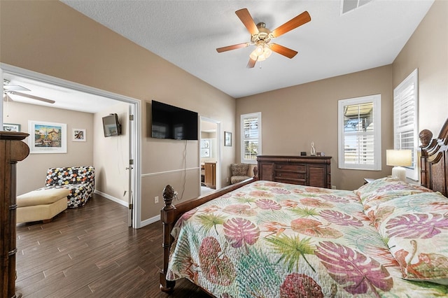 bedroom featuring dark wood-type flooring and ceiling fan