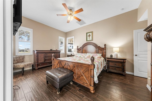 bedroom with multiple windows and ceiling fan