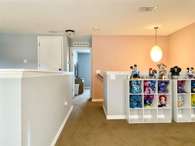 bar featuring carpet flooring and pendant lighting