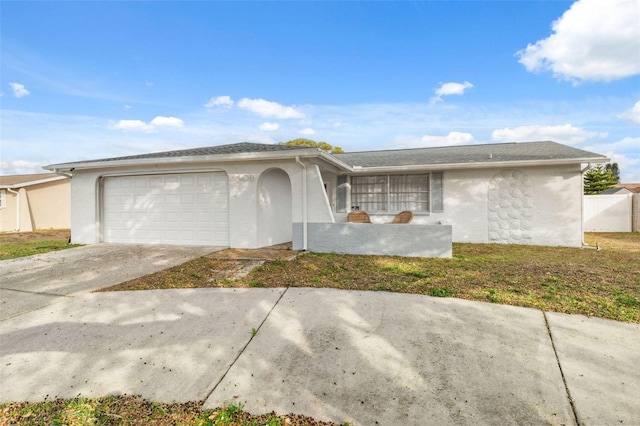 ranch-style home with a garage