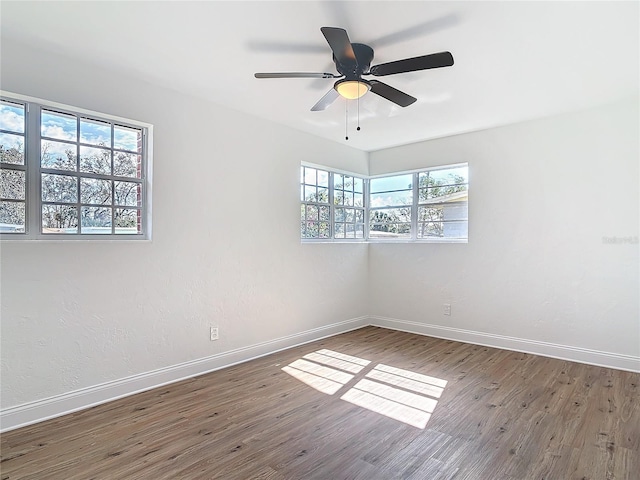 930 Lewis Dr, Daytona Beach, FL 32117 - empty room with baseboards, a ceiling fan, and wood finished floors