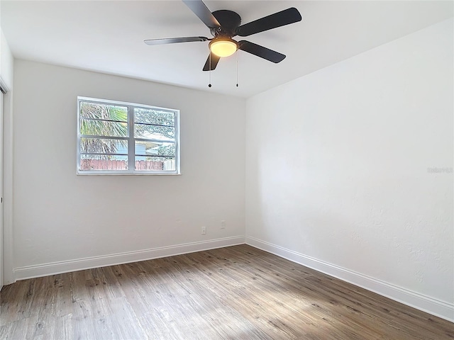 930 Lewis Dr, Daytona Beach, FL 32117 - unfurnished room with ceiling fan, baseboards, and wood finished floors