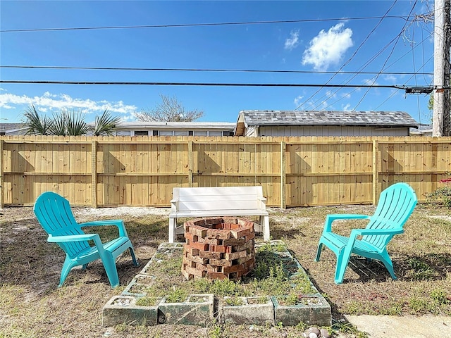 930 Lewis Dr, Daytona Beach, FL 32117 - view of yard with a fire pit and fence