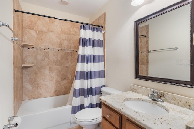 full bathroom featuring toilet, vanity, and shower / tub combo