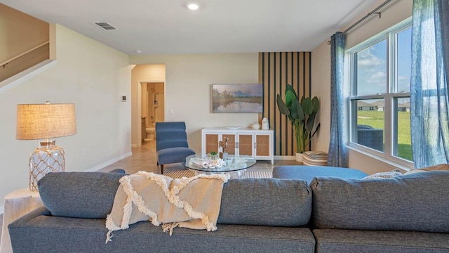 living room with tile patterned floors