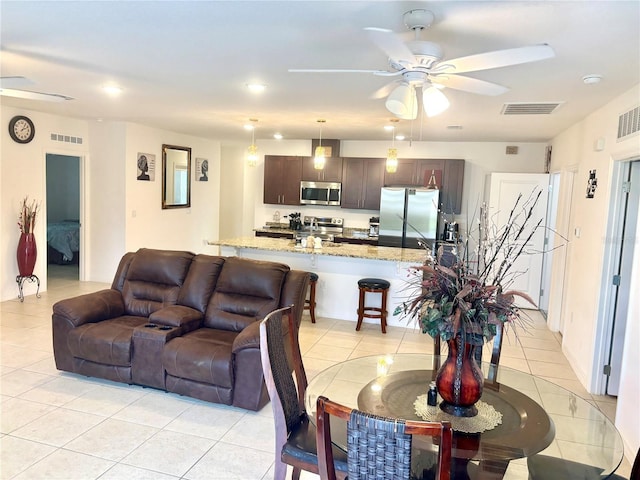 living room featuring light tile patterned floors