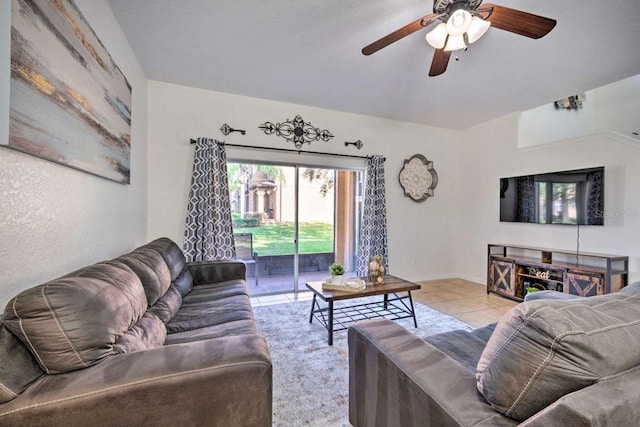 tiled living room with ceiling fan