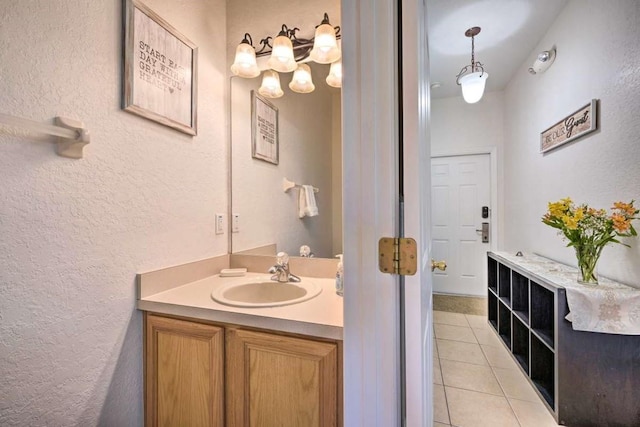 bathroom with vanity and tile patterned flooring