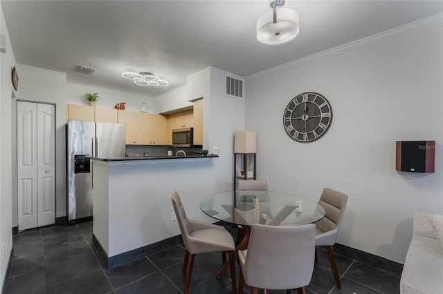 tiled dining area with ornamental molding