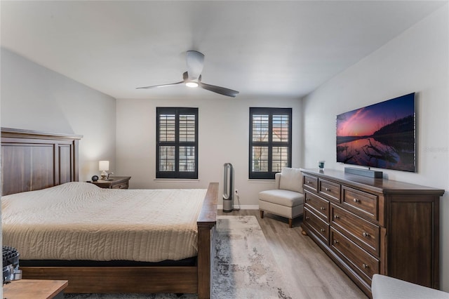 bedroom featuring ceiling fan and light wood-type flooring