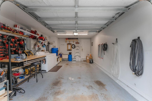 garage featuring washer and dryer