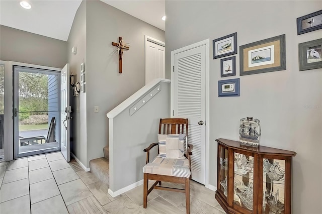 foyer entrance featuring light tile patterned flooring