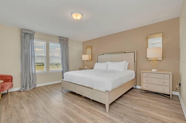 bedroom with light hardwood / wood-style floors