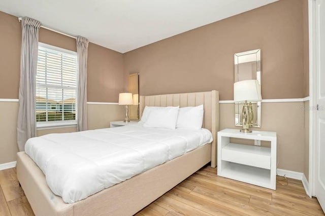 bedroom featuring light hardwood / wood-style flooring