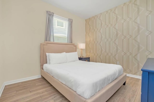 bedroom featuring light hardwood / wood-style flooring