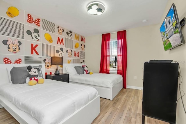 bedroom with light wood-type flooring