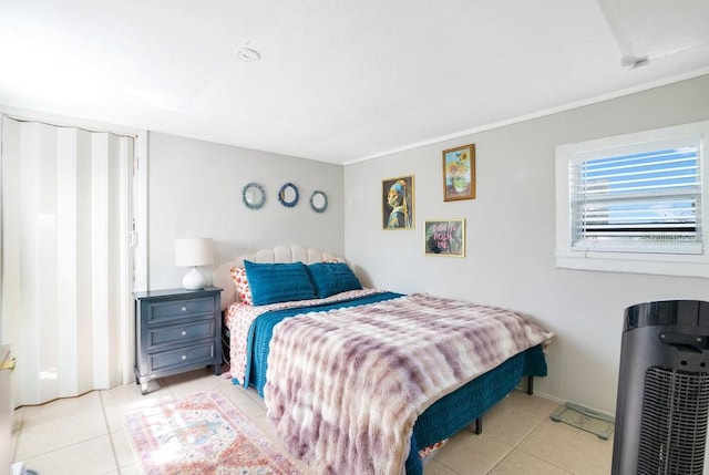 bedroom featuring light tile patterned floors