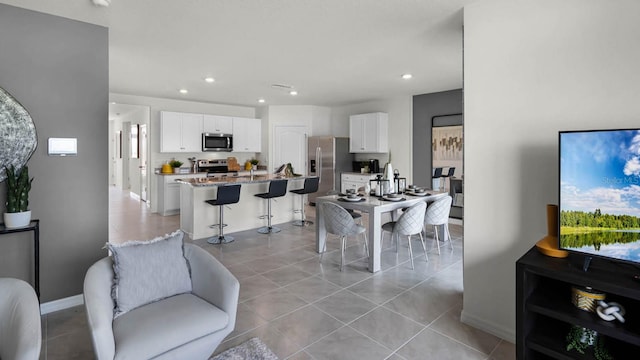 living room featuring light tile patterned floors