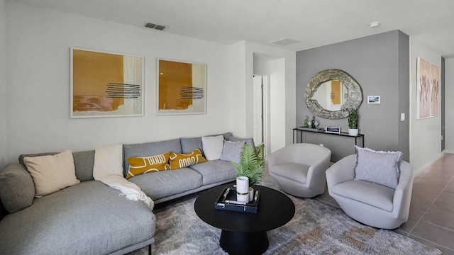 living room with tile patterned floors