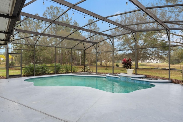 view of pool featuring a patio, glass enclosure, and a lawn