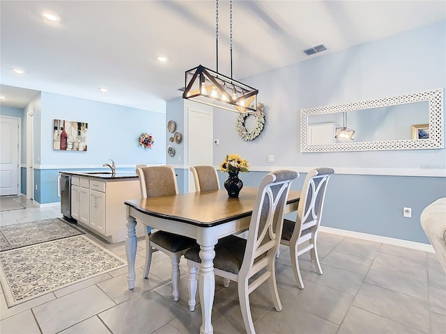 dining area with light tile patterned flooring