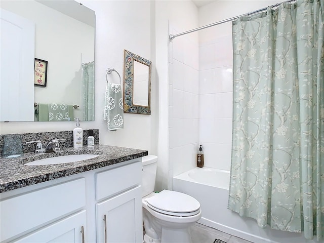 full bathroom featuring toilet, vanity, and shower / bath combo with shower curtain