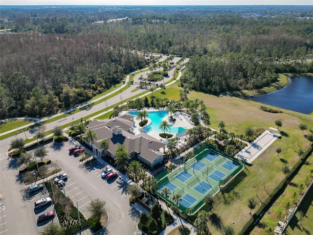 birds eye view of property with a water view