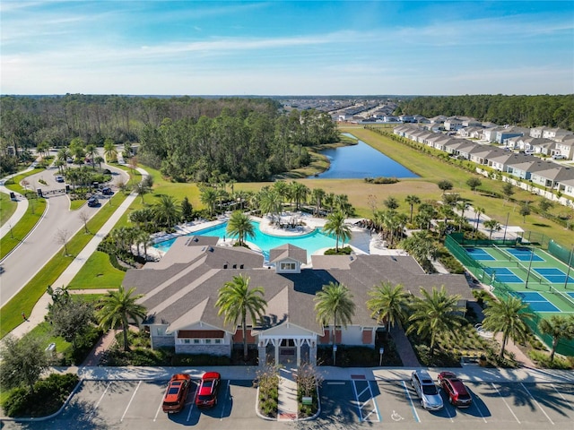 birds eye view of property featuring a water view