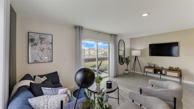 living room featuring light tile patterned flooring