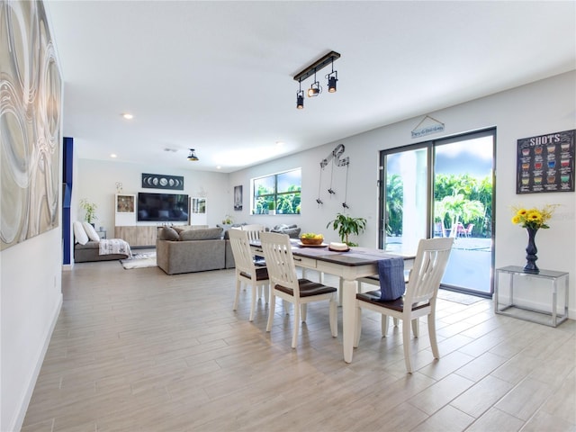 dining space featuring light hardwood / wood-style floors