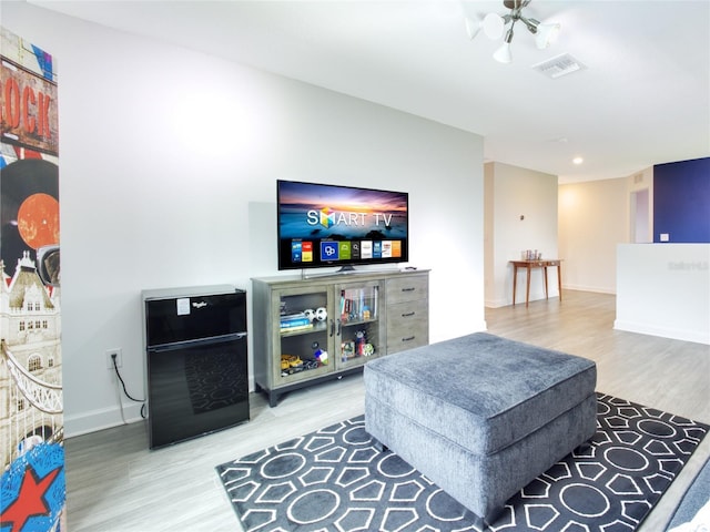 living room with wood-type flooring