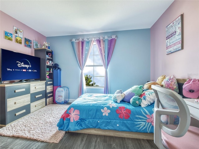 bedroom with wood-type flooring