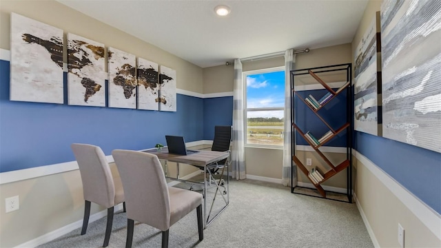 office area with light colored carpet