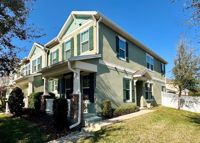 view of front facade featuring a front yard