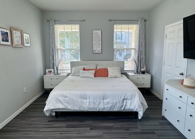 bedroom featuring dark hardwood / wood-style flooring