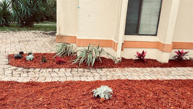 exterior space with stucco siding