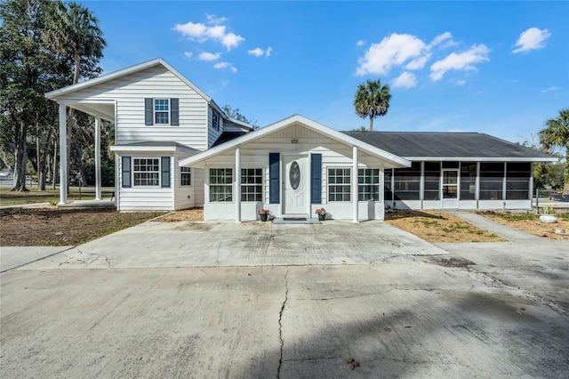 front of property with a sunroom