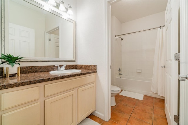 full bathroom featuring tile patterned flooring, vanity, shower / tub combo with curtain, and toilet