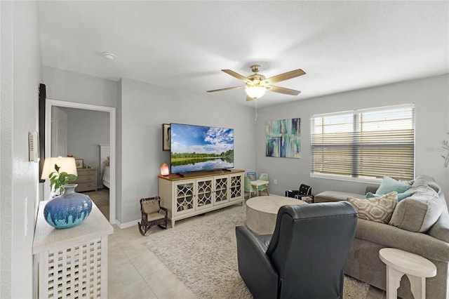 tiled living room featuring ceiling fan