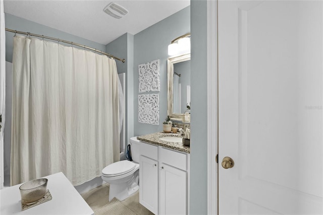 bathroom with tile patterned floors, toilet, and vanity