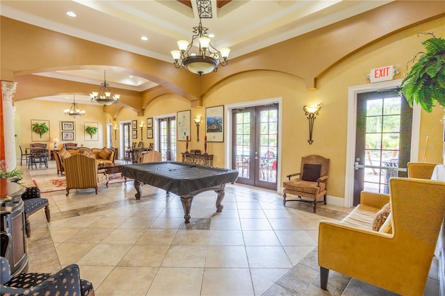 351 Lazio Cir, Debary, FL 32713 - rec room with a tray ceiling, french doors, a chandelier, crown molding, and plenty of natural light