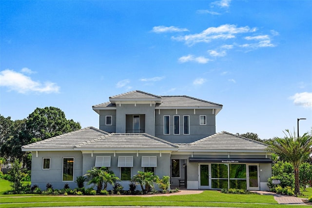 view of front of property with a front lawn